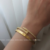 بنگل کارتیه لاو استیل طلایی | بنگل زنانه | Gold Steel Bangle | Dorchida.ir